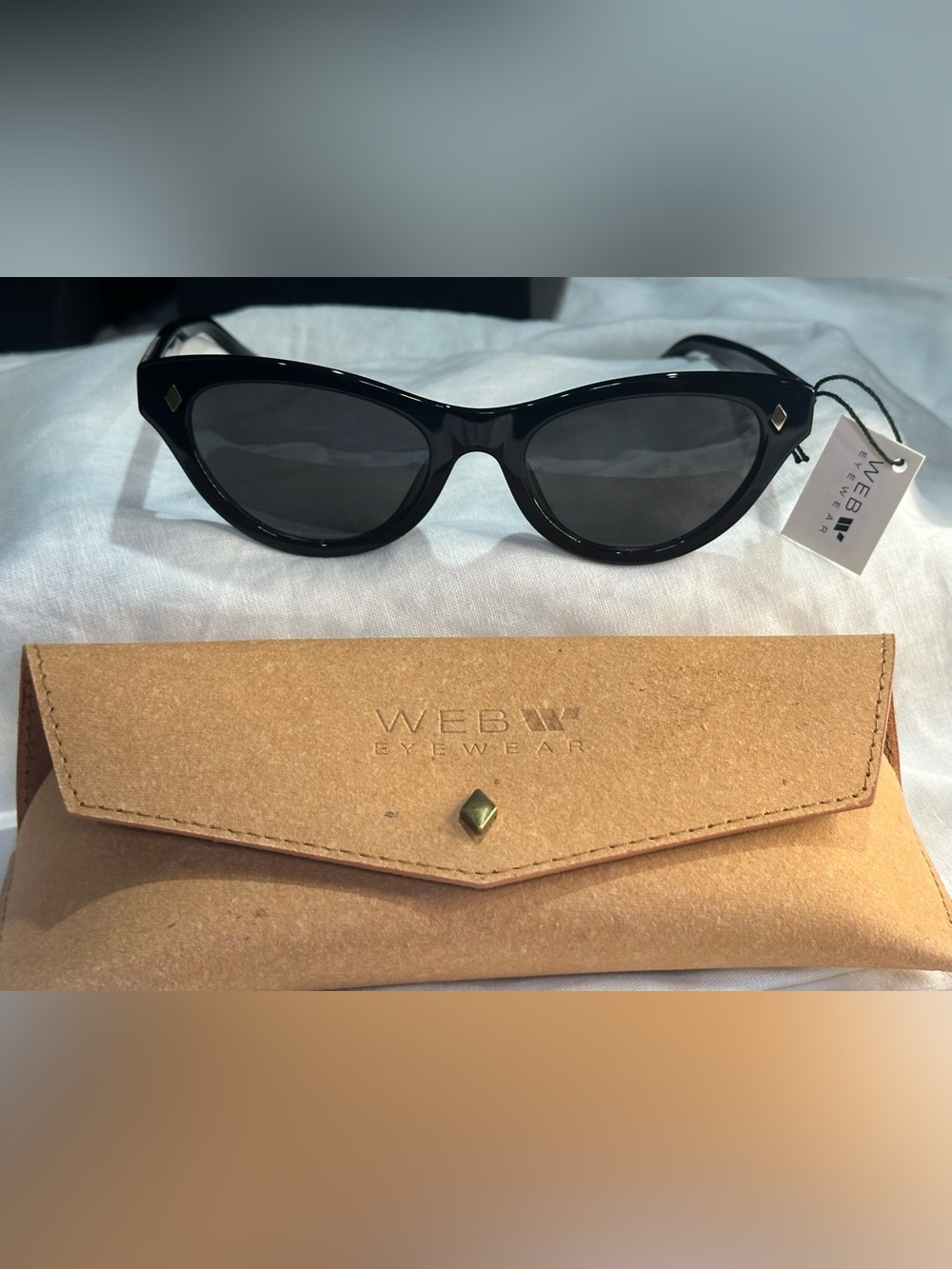 9. NEW WEB Eyewear Women's Black Cat-Eye Sunglasses with Matching Case